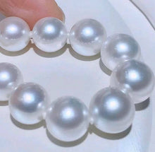 Load image into Gallery viewer, 9-11mm Australian White South Sea Pearl!! Full Round, Minor Flaw!
